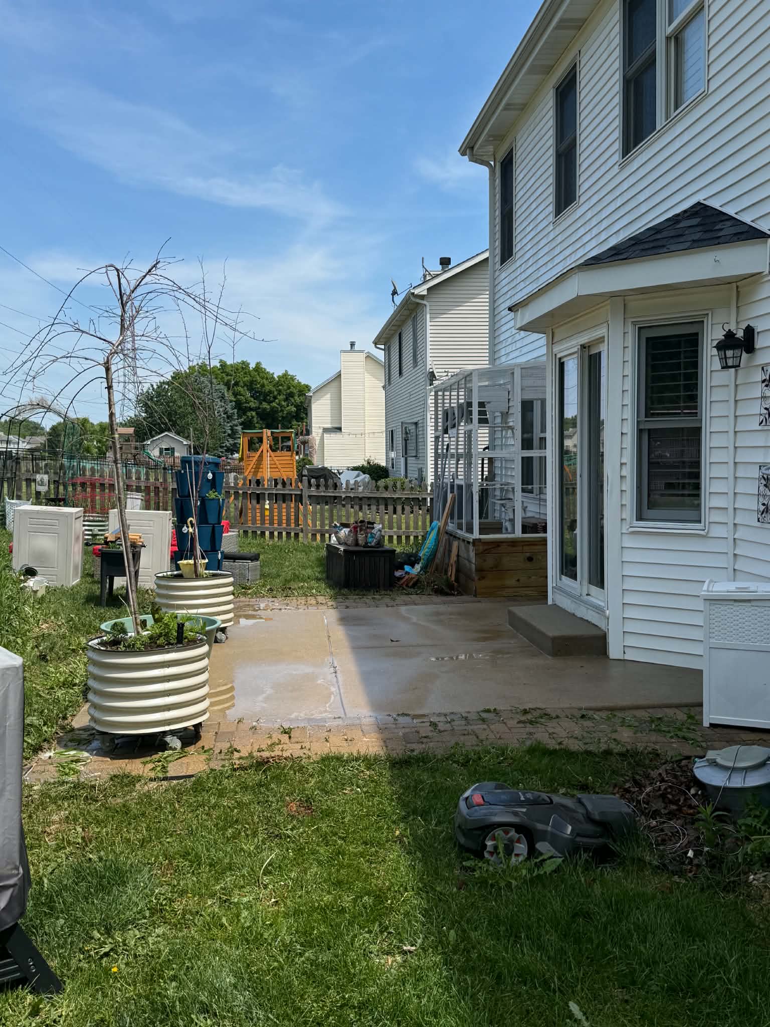 Backyard patio pressure washing in progress Woodstock IL