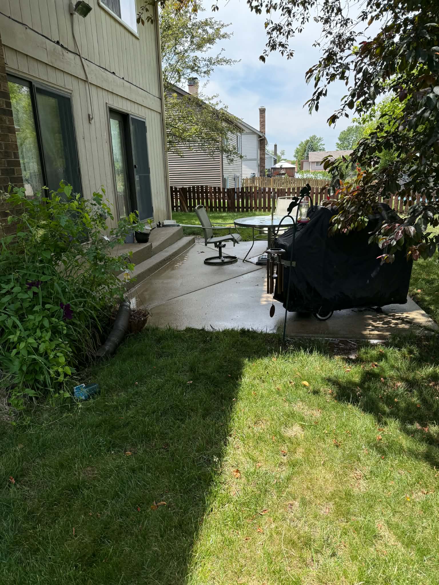 Concrete patio pressure washed clean Rob's Exterior Services
