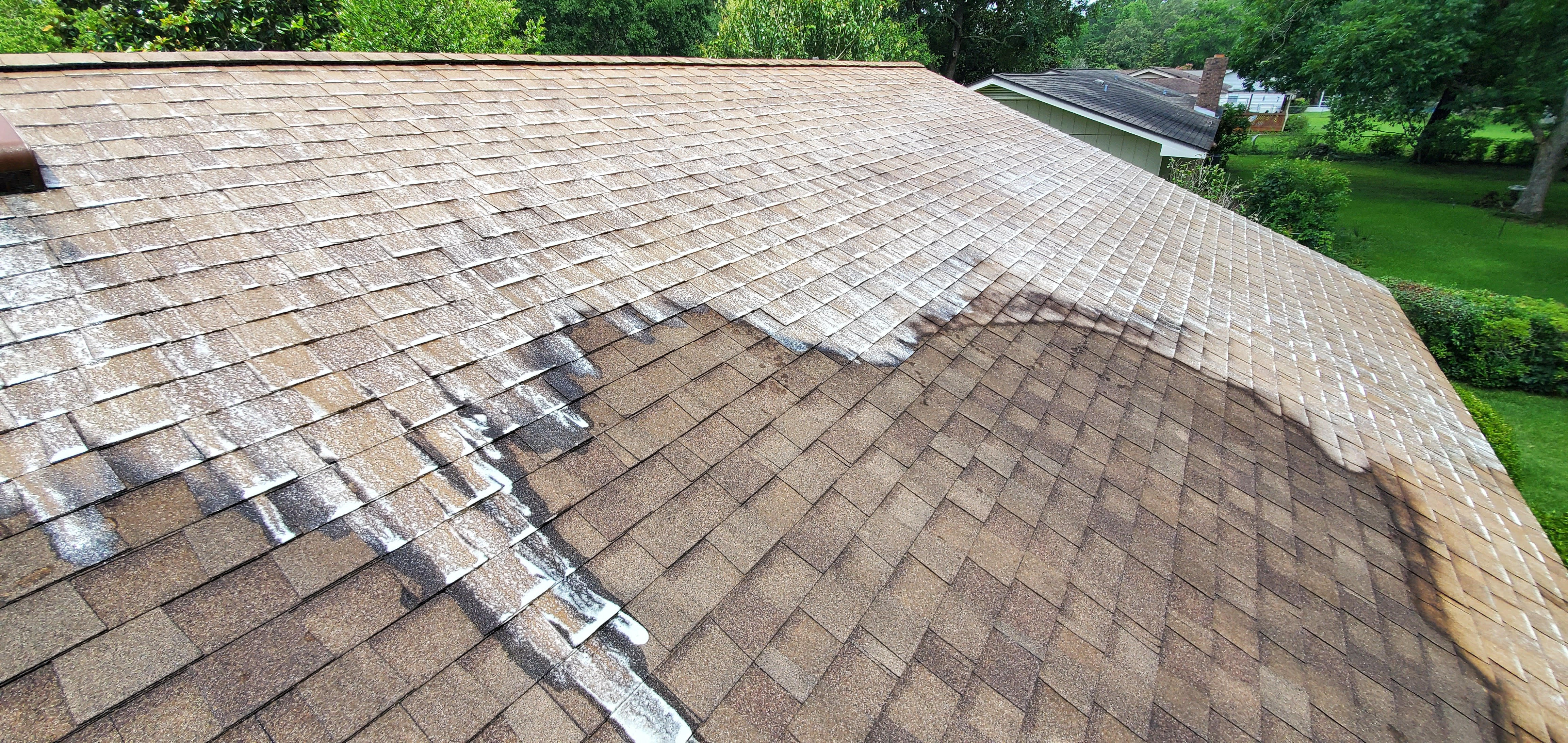 Roof washing soft wash treatment applied Woodstock IL