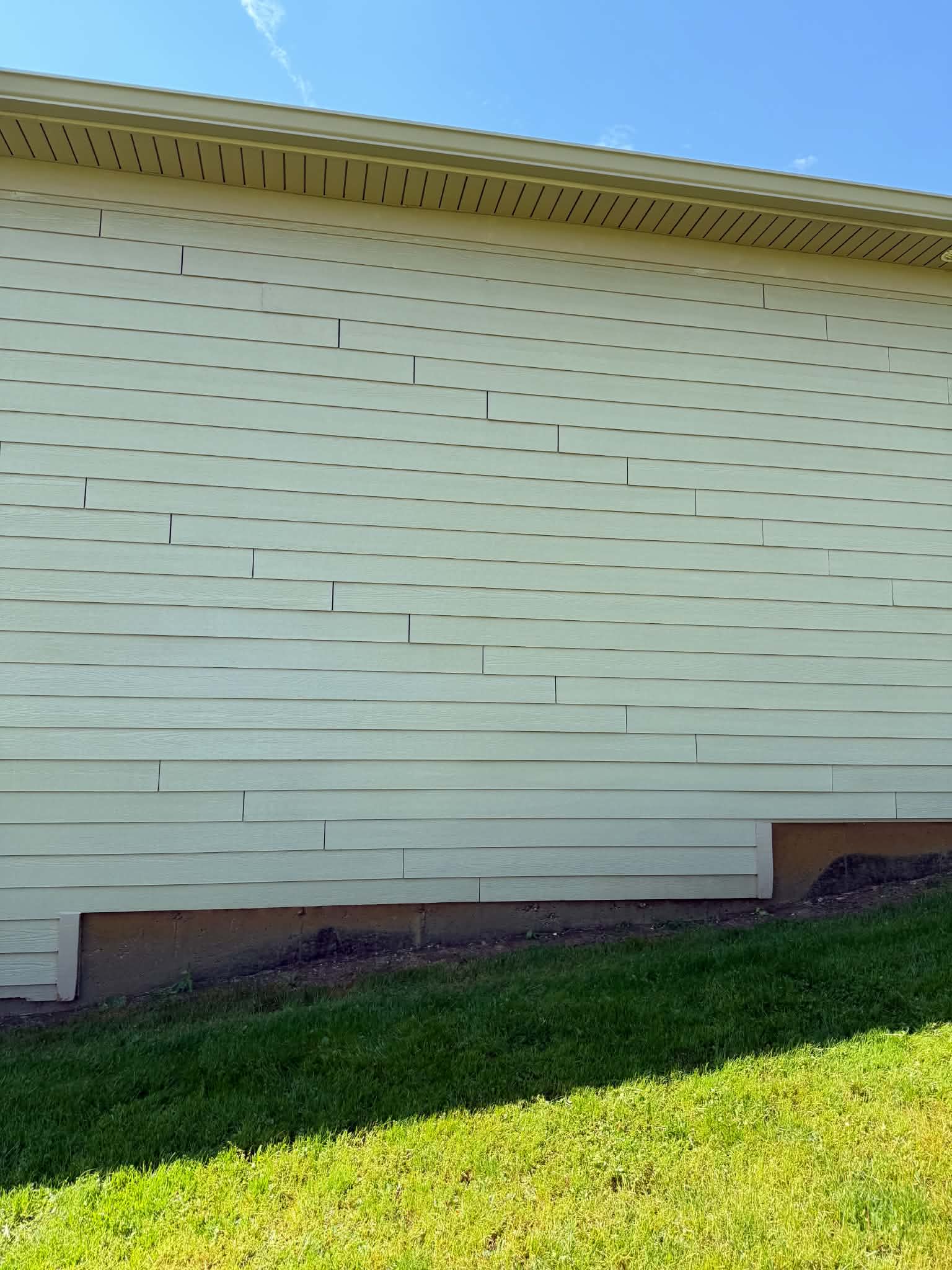 Clean siding after soft wash service Rob's Exterior Services